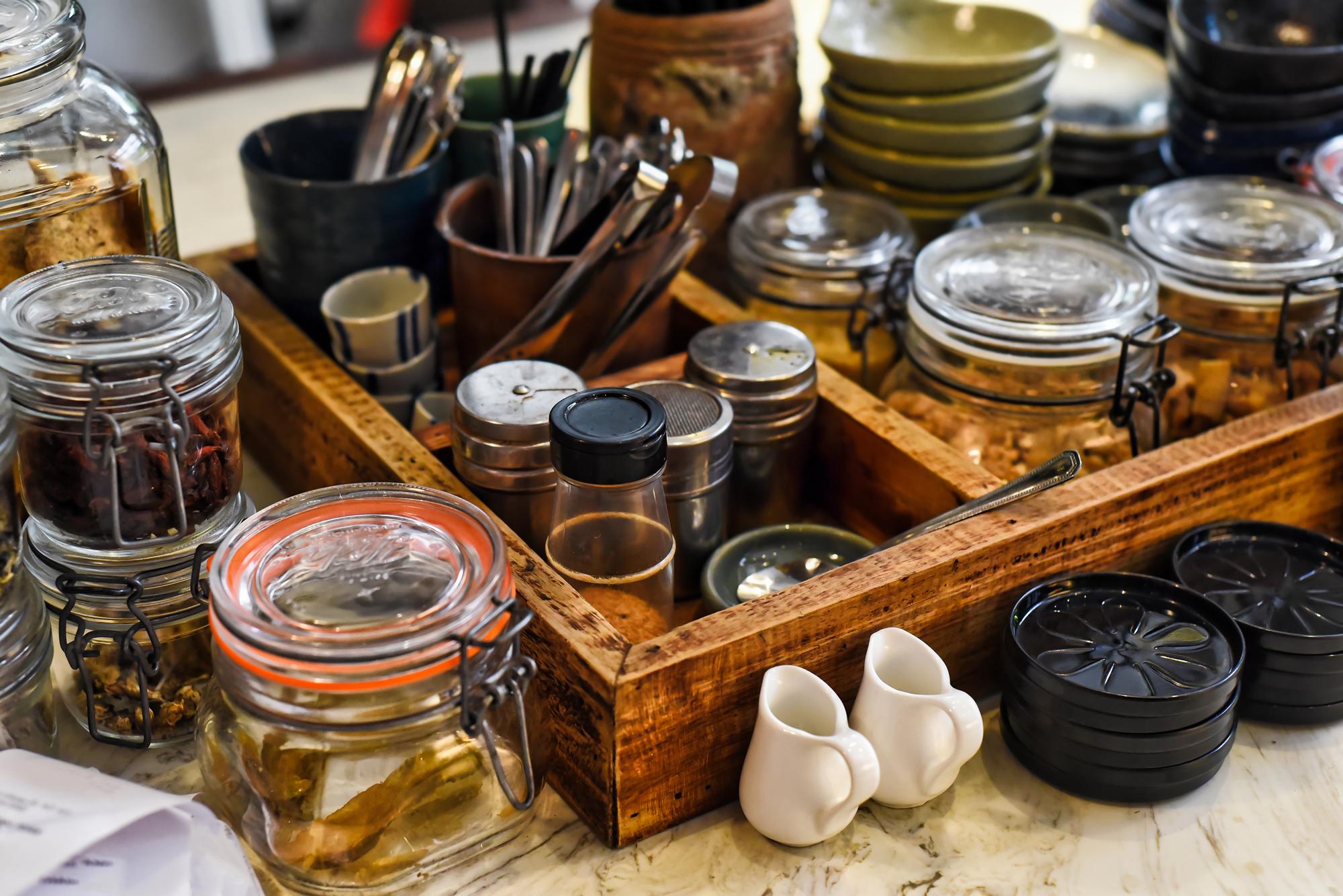 Cozy workshop kitchen counter with jars and tools